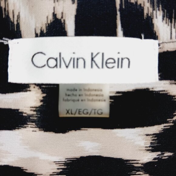 Calvin Klein XL Leopard Long Sleeve Top W/ Ruffled Sleeve Hem, 1/4 Button Front - Picture 2 of 16